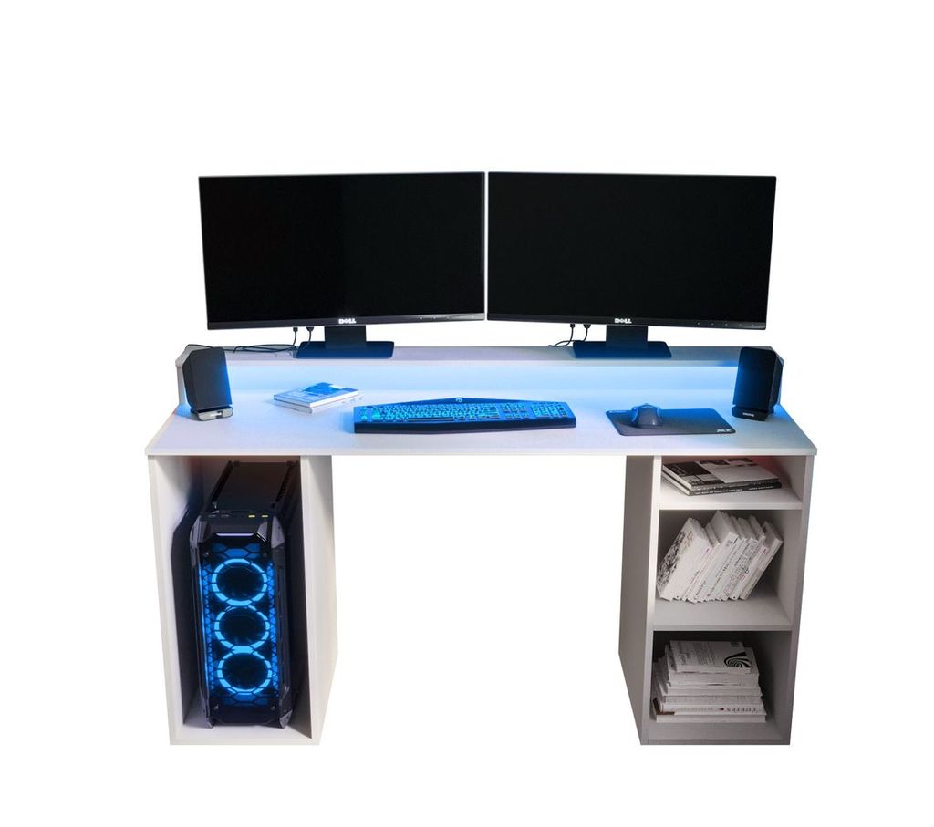 A white computer desk with two monitors, a keyboard, mouse, speakers, and a computer tower. The desk has built-in shelving on the right side.