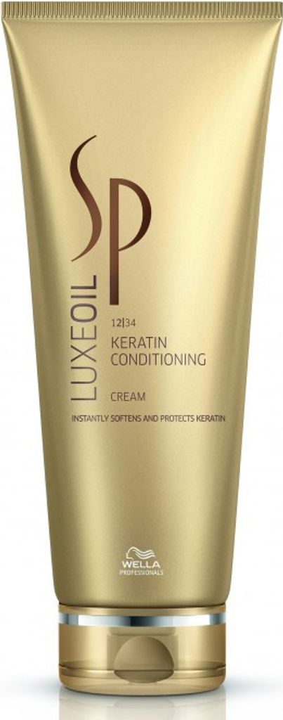 A gold colored tube of Wella Professionals SP Luxe Oil Keratin Conditioning Cream.