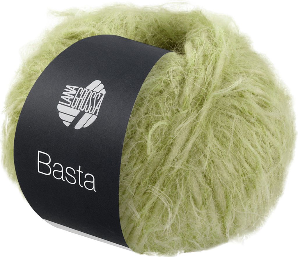 A ball of light green, fuzzy yarn with a black label wrapped around it.