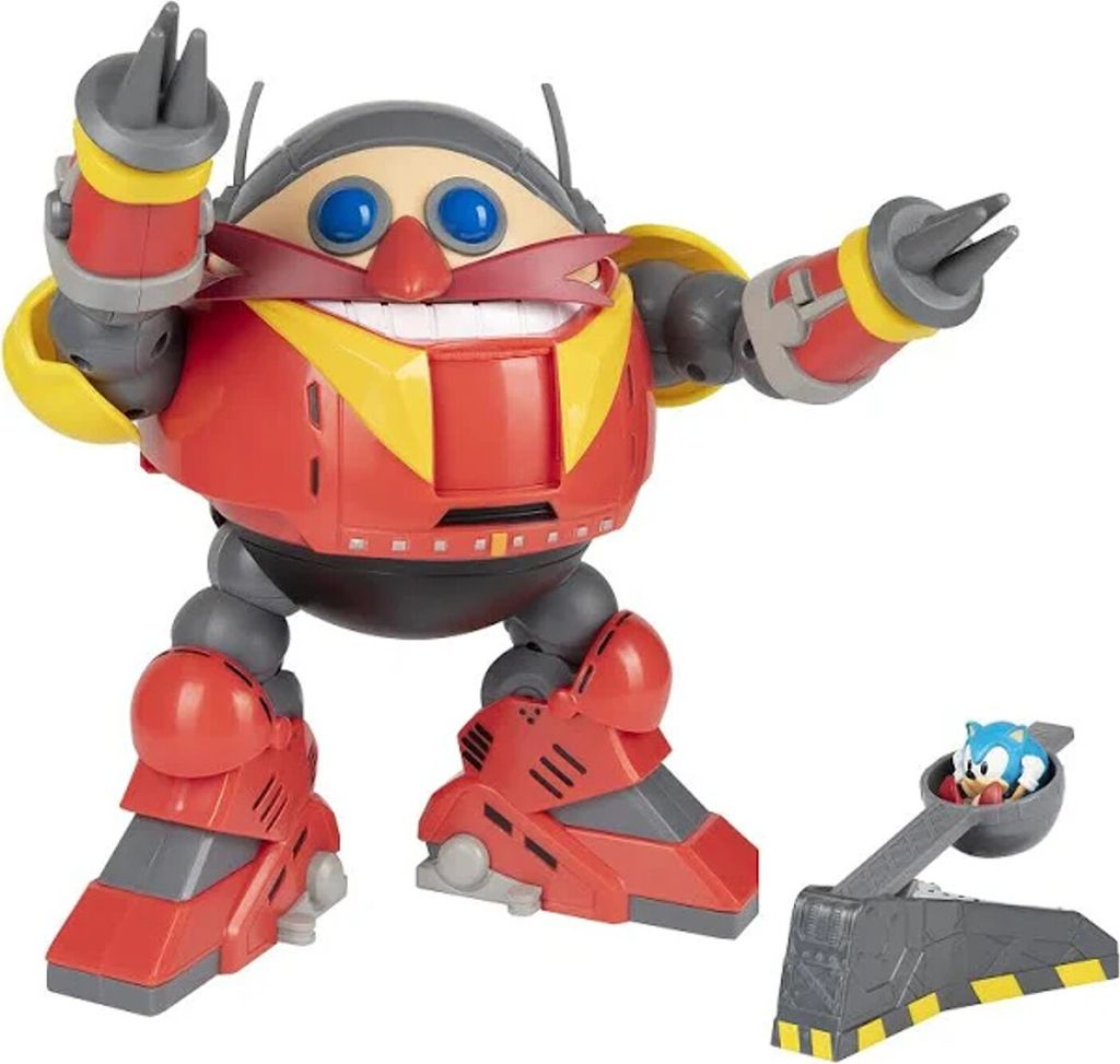 A toy robot and a small figure on a white background.