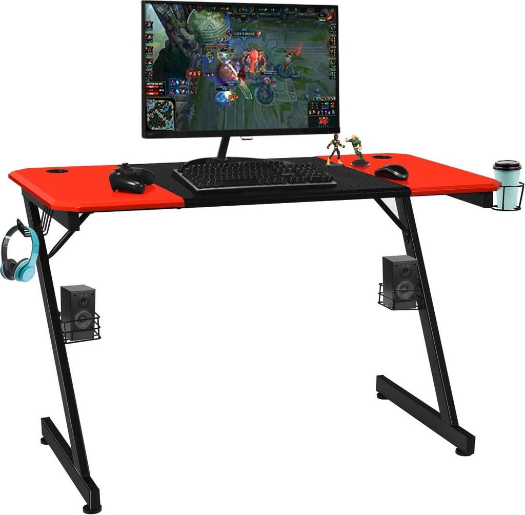 A gaming desk with a computer monitor, keyboard, mouse, and accessories.