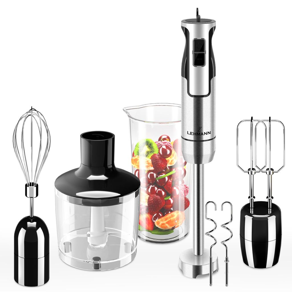 A collection of hand blender attachments and a beaker filled with fruit.