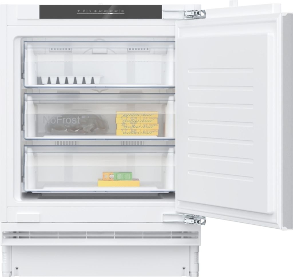 An open built-in freezer with multiple drawers.
