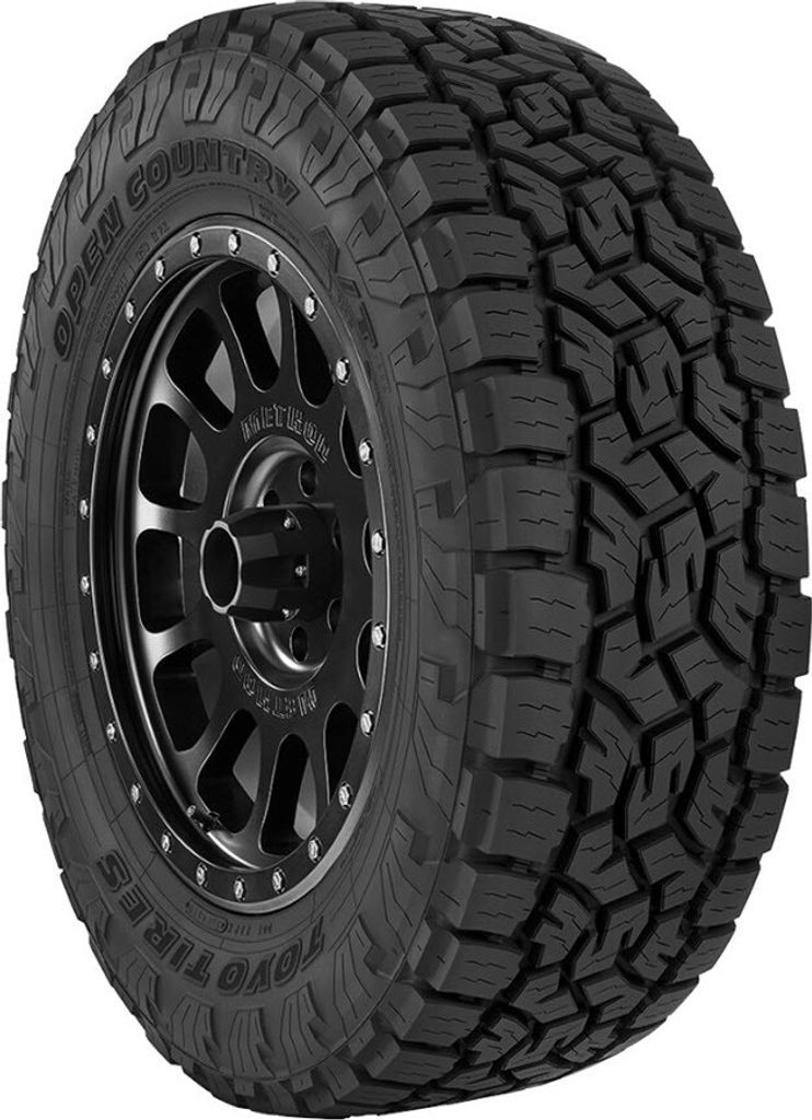 A close-up of a Toyo Open Country A/T III tire mounted on a black wheel.