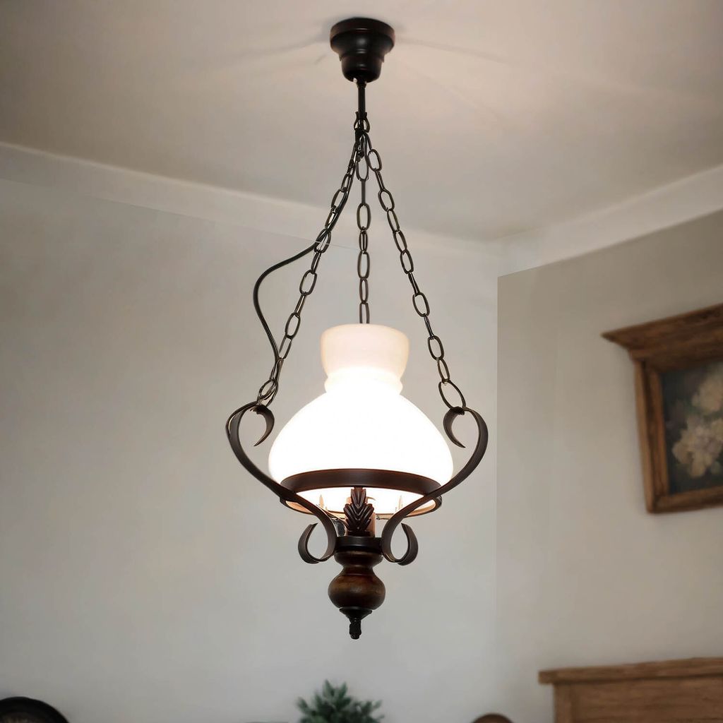 A hanging lamp is shown against a white ceiling and wall.