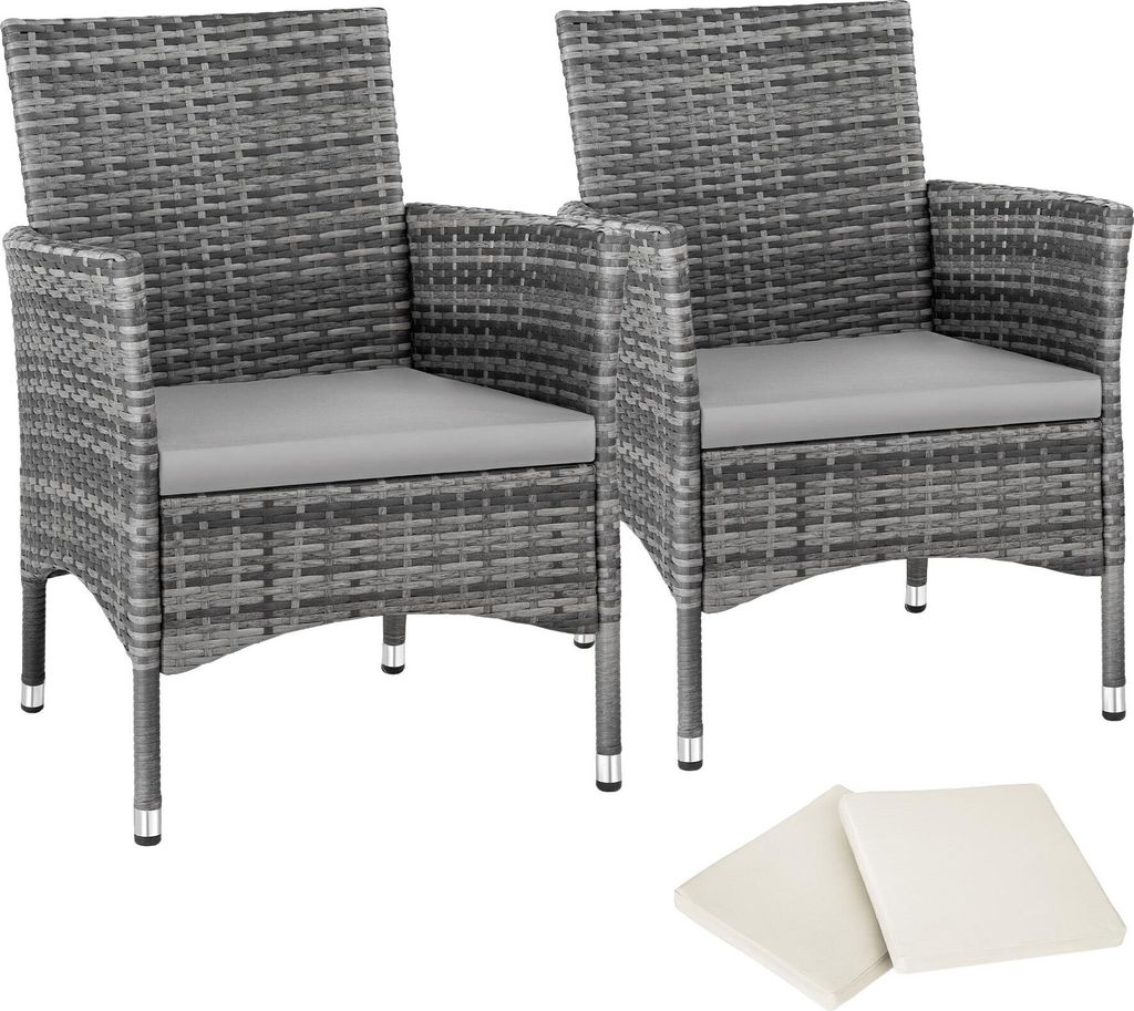 Two gray rattan chairs with light gray cushions are shown against a white background, with two light beige square objects in the foreground.
