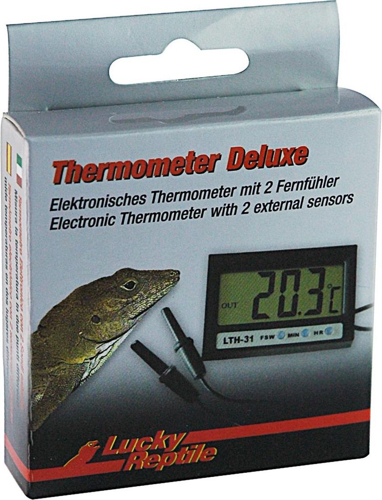 The image shows the packaging of a Lucky Reptile thermometer deluxe with a lizard illustration and a digital display showing the temperature.