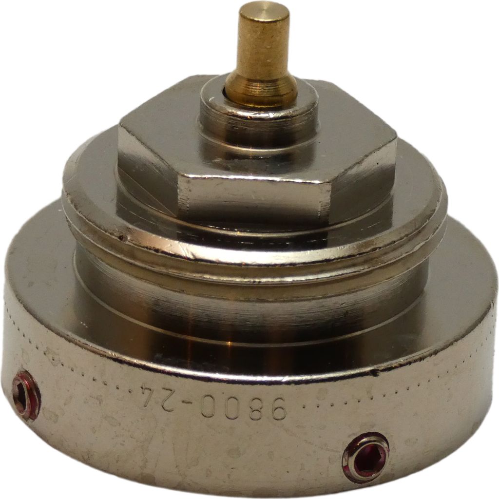 A close-up studio shot of a metal adapter part.