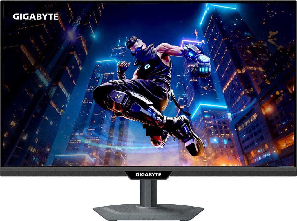 A gaming monitor displaying a dynamic image of a character leaping through a futuristic city.