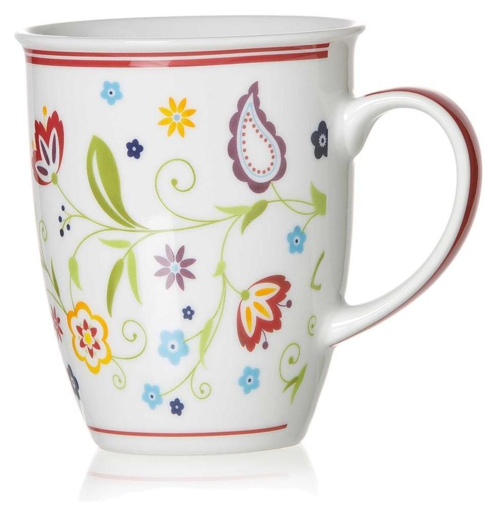 A white ceramic mug with a floral and paisley pattern.