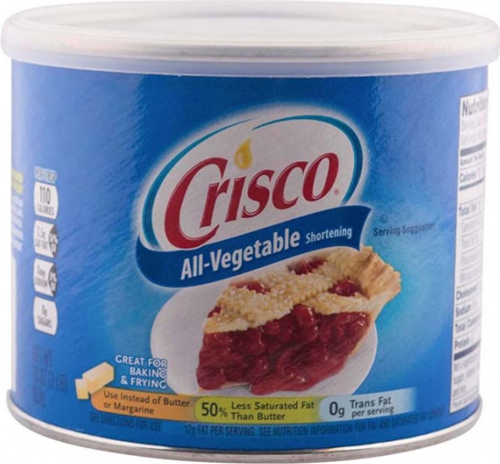 A can of Crisco All-Vegetable Shortening with a slice of pie on the label.