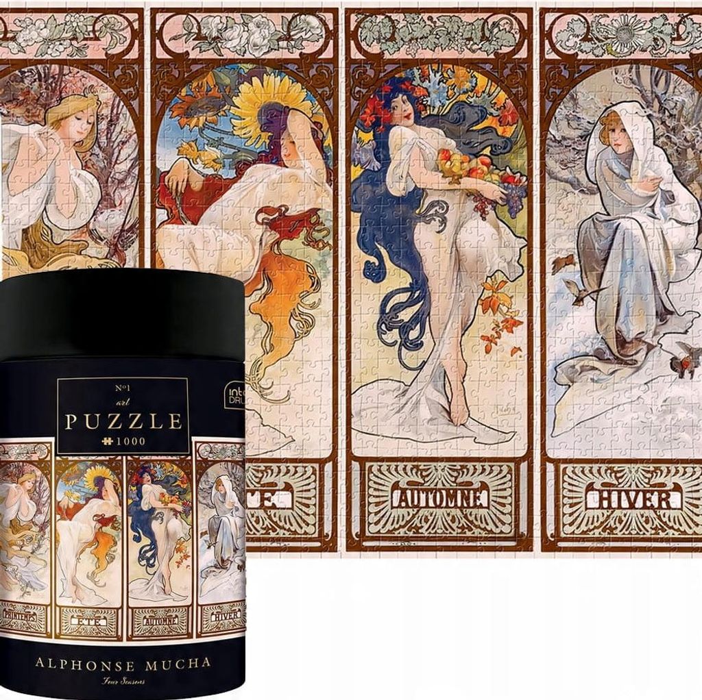 A cylindrical puzzle box is placed in front of a puzzle depicting Alphonse Mucha's "Four Seasons" artwork.