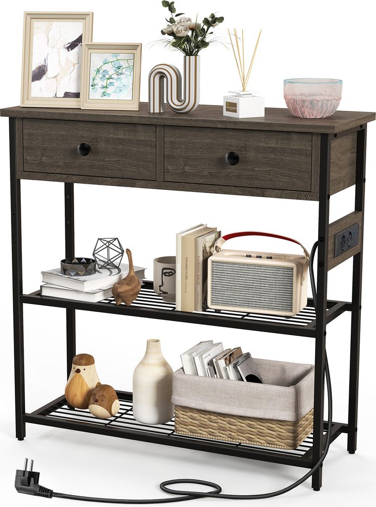A console table with two drawers and two shelves, decorated with various items, including books, a radio, and decorative objects. A power cord is visible at the bottom.