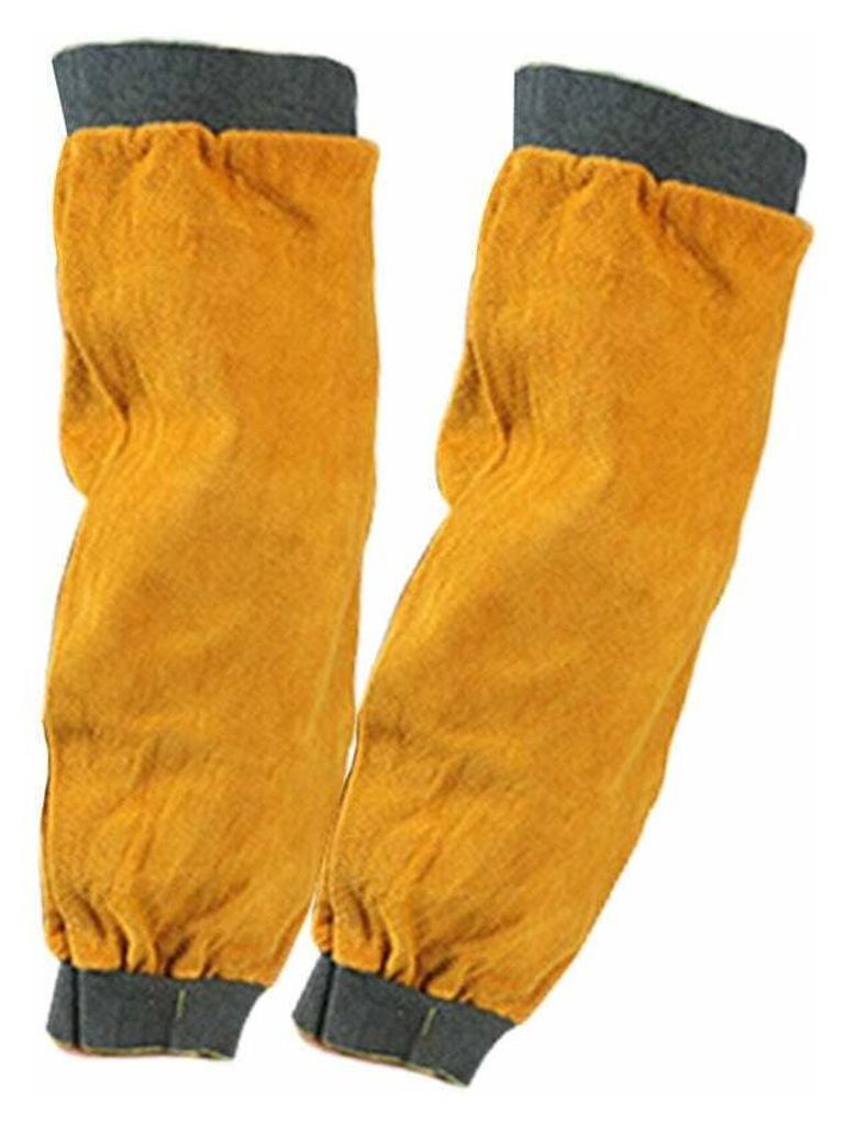 A pair of yellow leather arm sleeves with gray cuffs.
