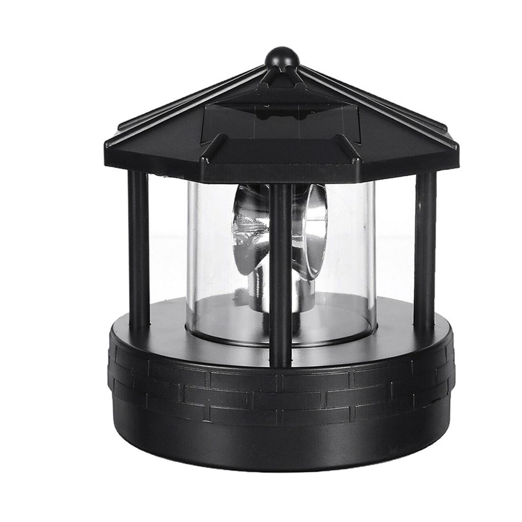 A black solar-powered lighthouse lamp.
