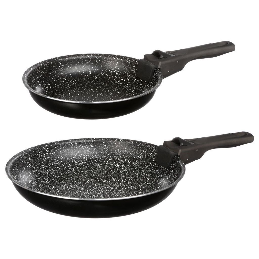 Two black frying pans with speckled interiors and black handles are shown against a white background.