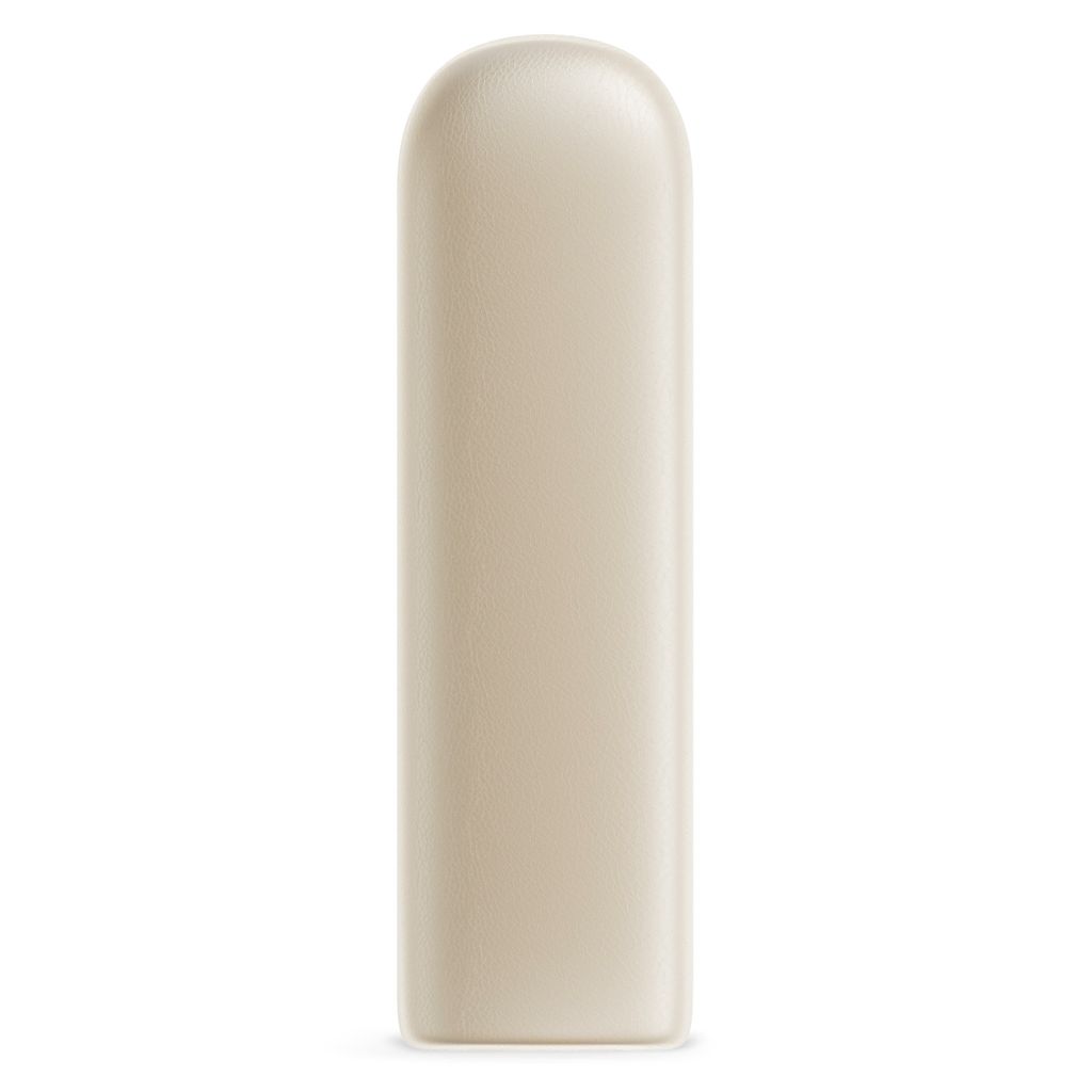 A single, cream-colored, capsule-shaped object with rounded ends, presented against a plain white background.