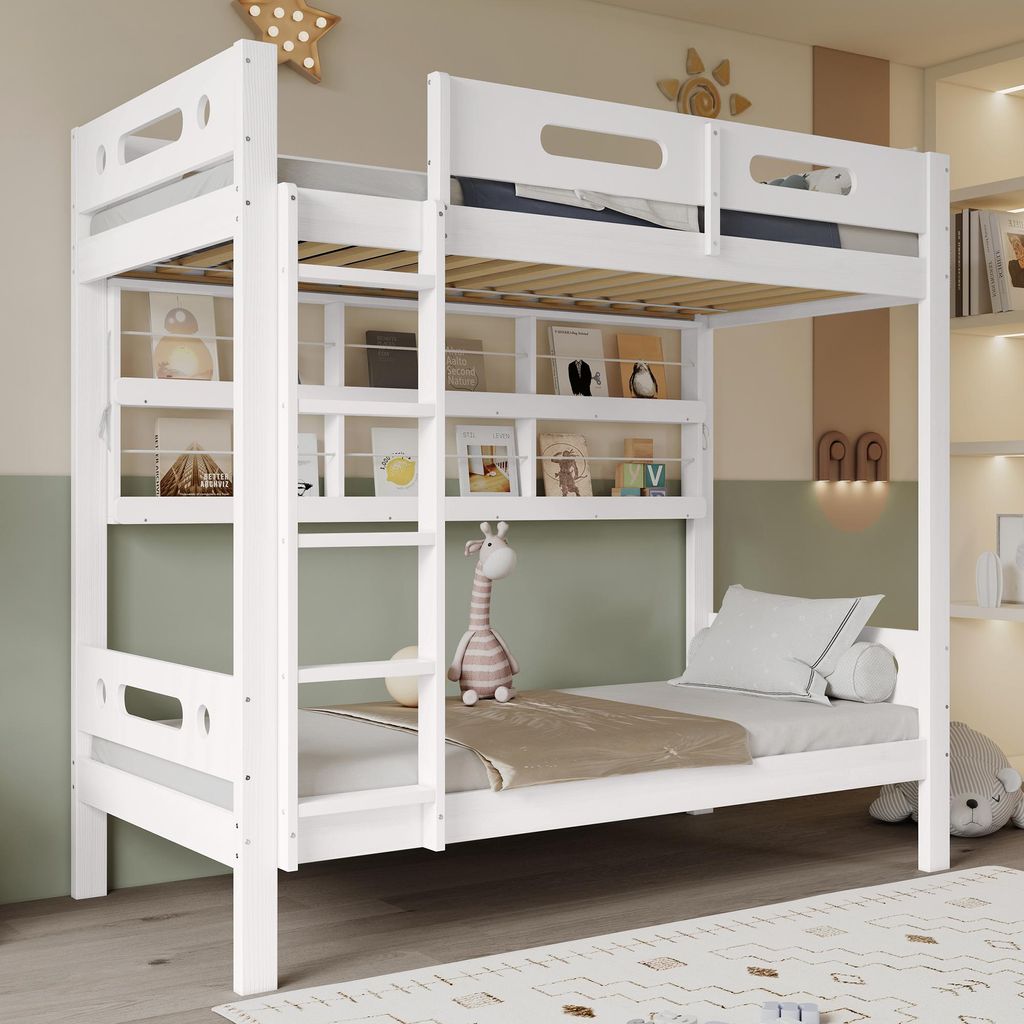 A white bunk bed with shelves, a stuffed giraffe, and bedding in a child's room.