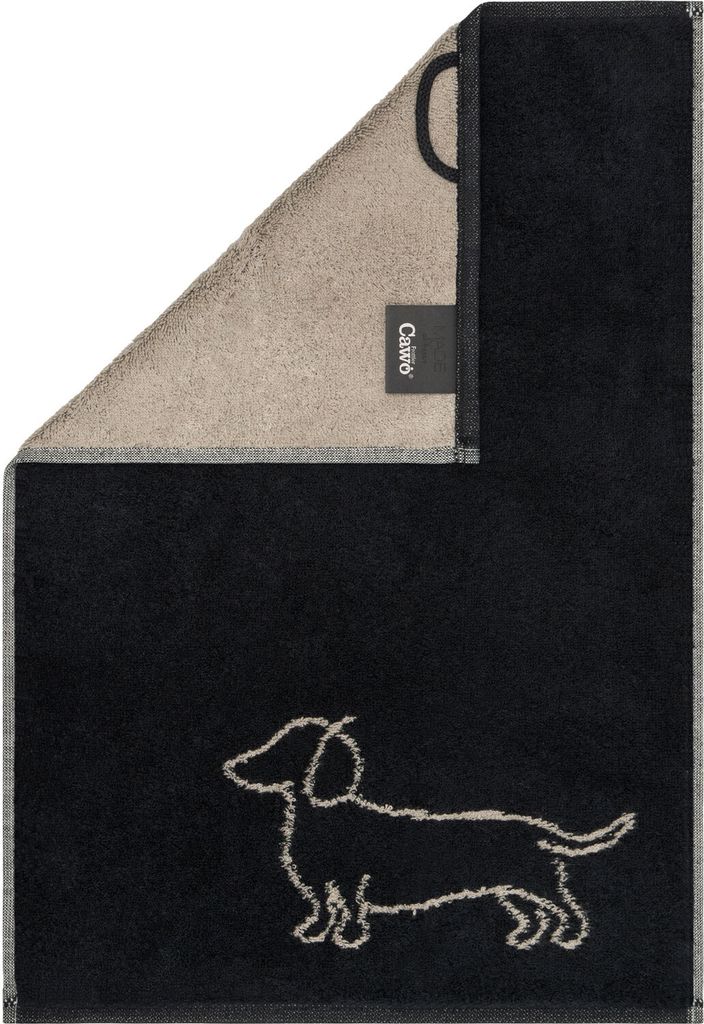 A folded towel with a dachshund embroidered on it.