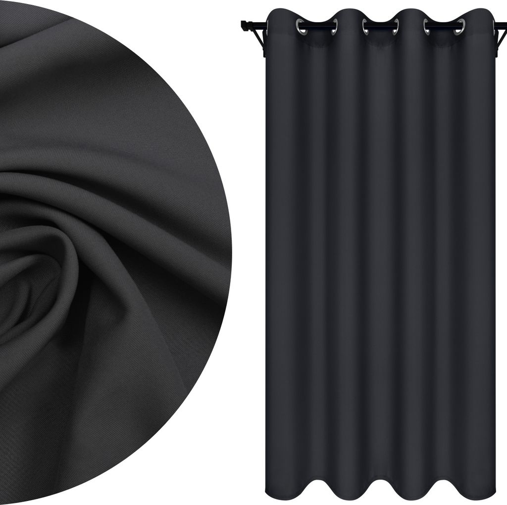 A close-up of fabric texture and a hanging curtain.