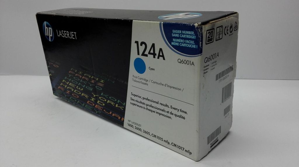 A product box for an HP toner cartridge, shown at an angle on a light gray and white surface.