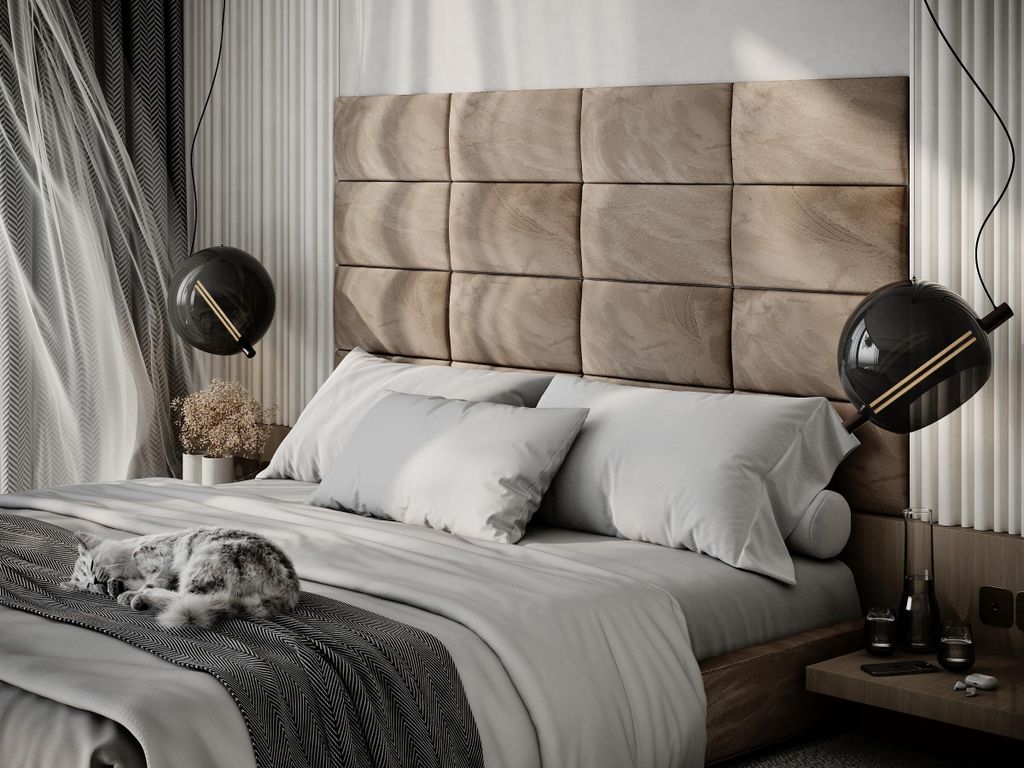 A bedroom scene with a cat sleeping on a bed.