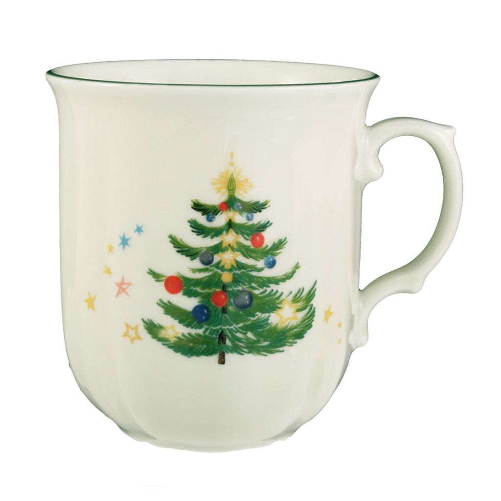A white mug with a Christmas tree design and stars.