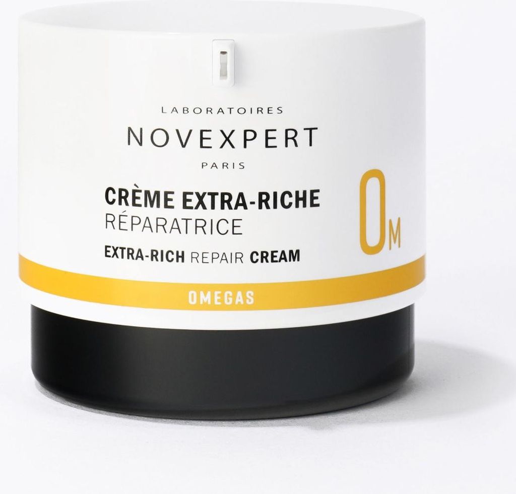 A white and black jar of Novexpert cream with yellow accents.
