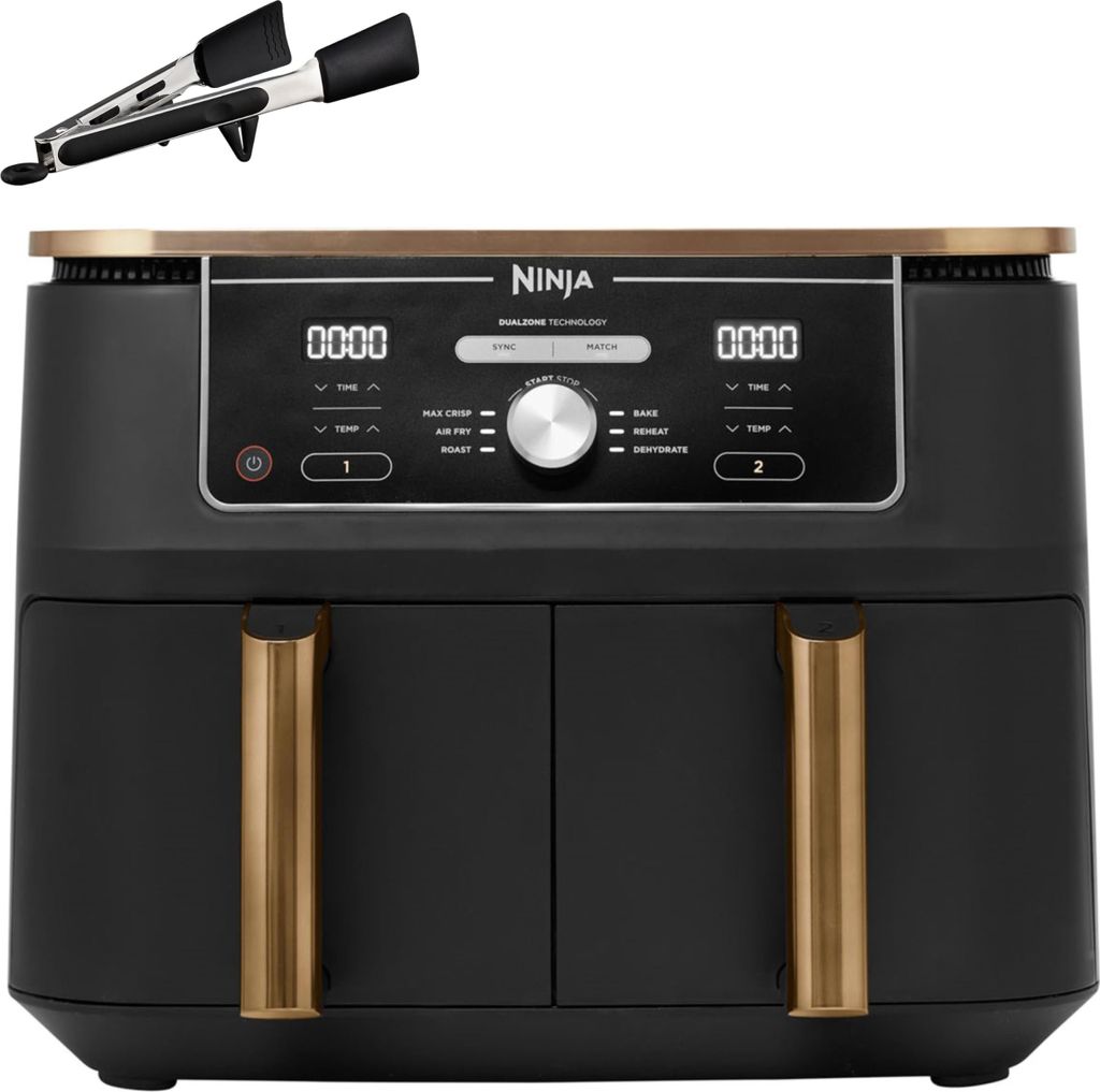 A black and gold Ninja Foodi Max Dual Zone air fryer with a pair of tongs above it, set against a white background.