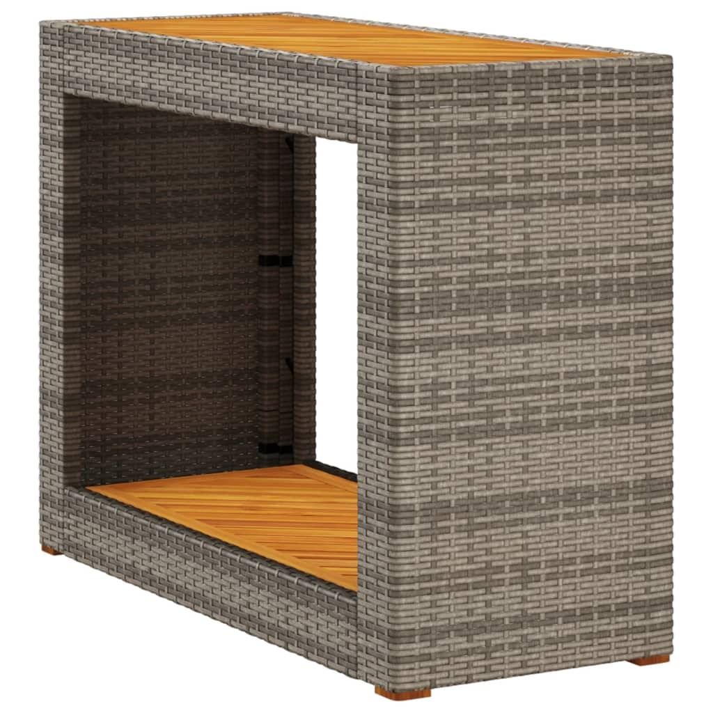 A rectangular side table made of grey rattan with a wooden top and shelf.