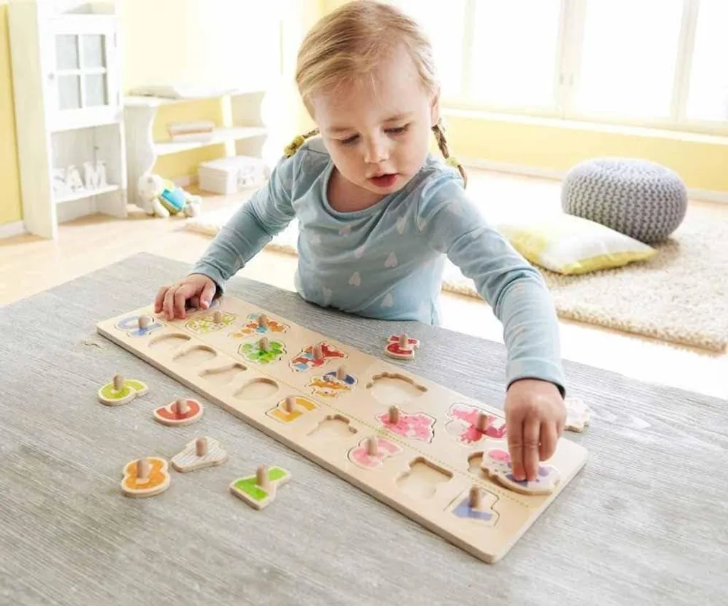 Apprendre les chiffres avec le puzzle de préhension animaux éveil