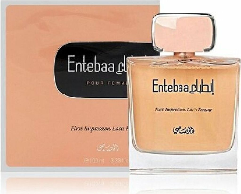 A bottle of perfume and its packaging are displayed against a white background.