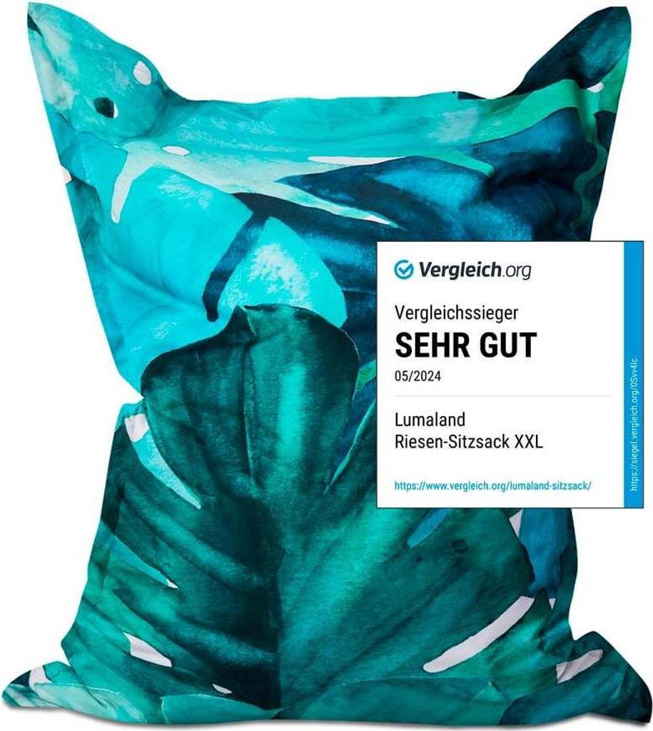 A large beanbag with a tropical leaf print, with a "Vergleich.org" rating badge overlaid.