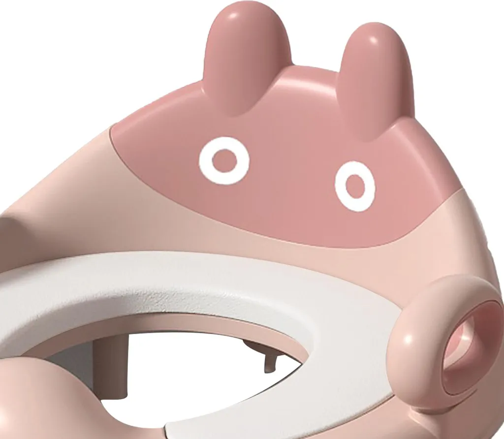 Apprentissage propreté bébé : siège de toilette rose avec poignées