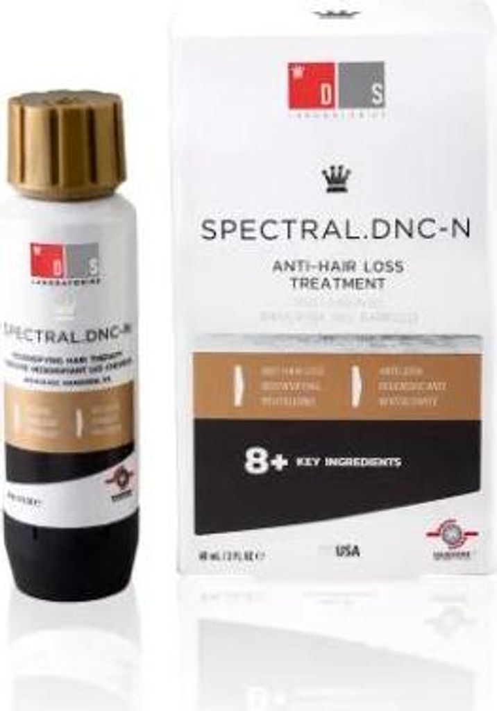 A product shot of a hair loss treatment bottle and its box, presented on a white background.