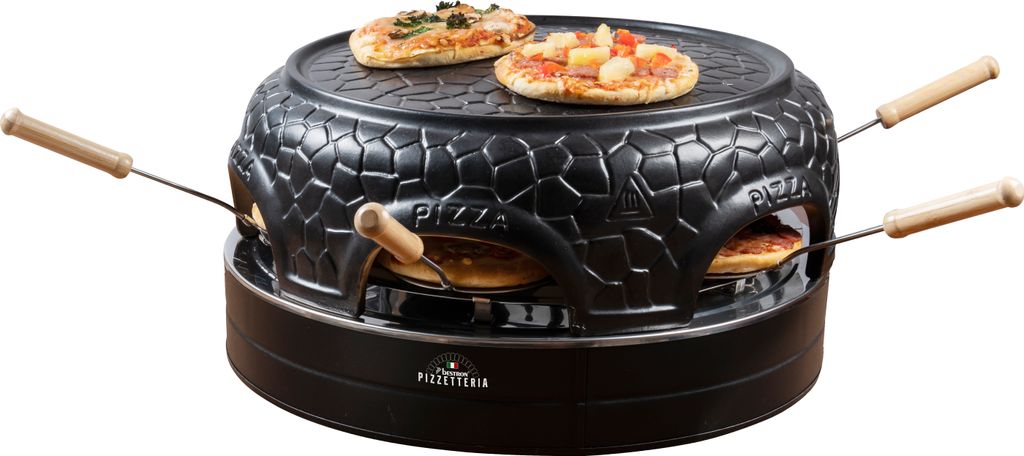 A black pizza oven with wooden handles and two small pizzas on top and two inside.