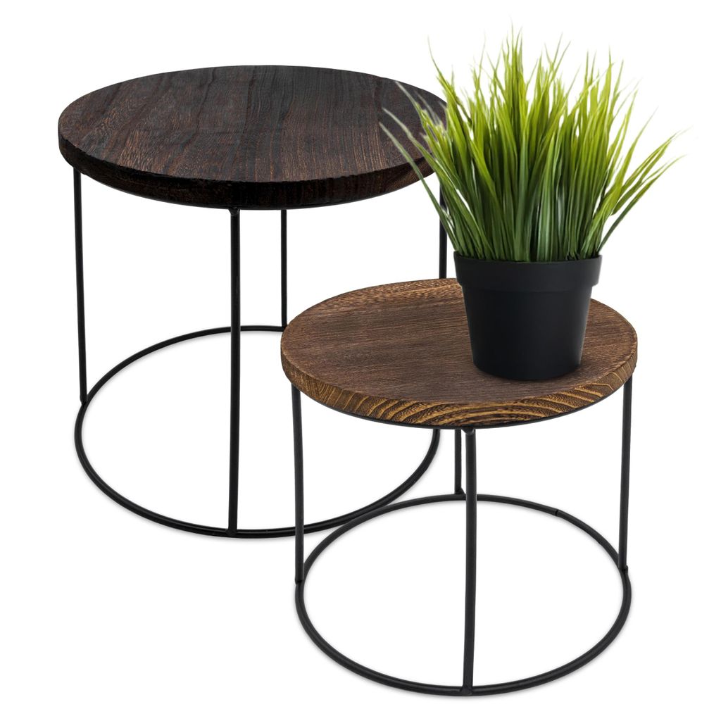 Two nesting tables with dark wood tops and black metal frames, one with a potted plant.