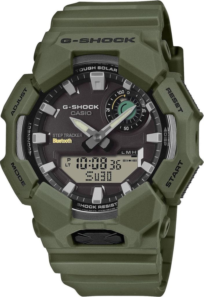 A close-up studio shot of a green G-Shock watch.