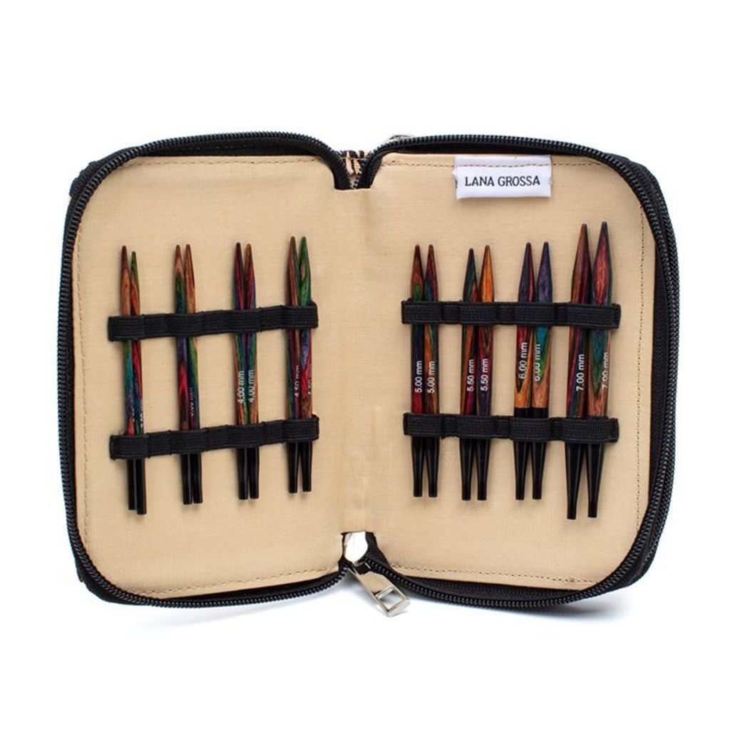 An open knitting needle case showing sets of knitting needles.