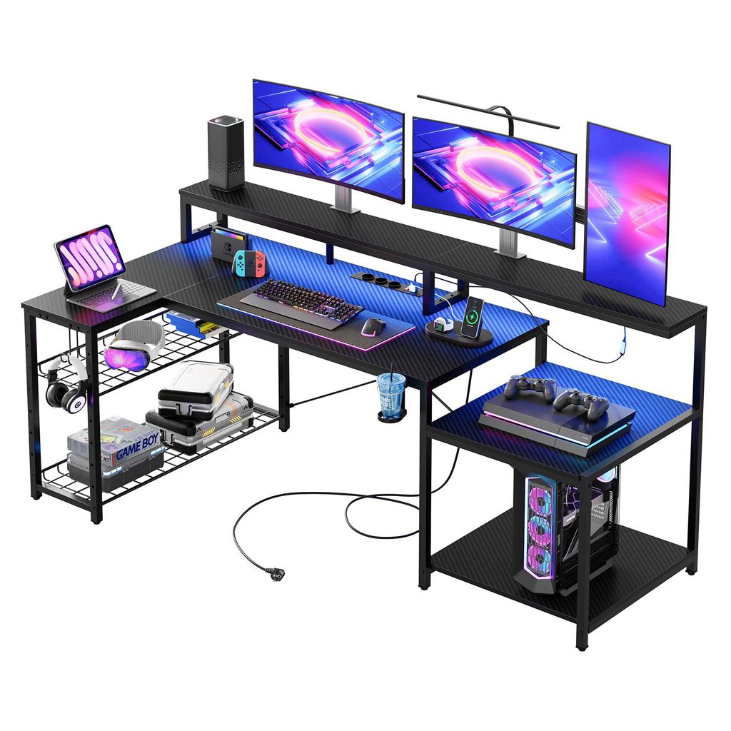 A gaming desk setup with multiple monitors, a computer, and accessories.