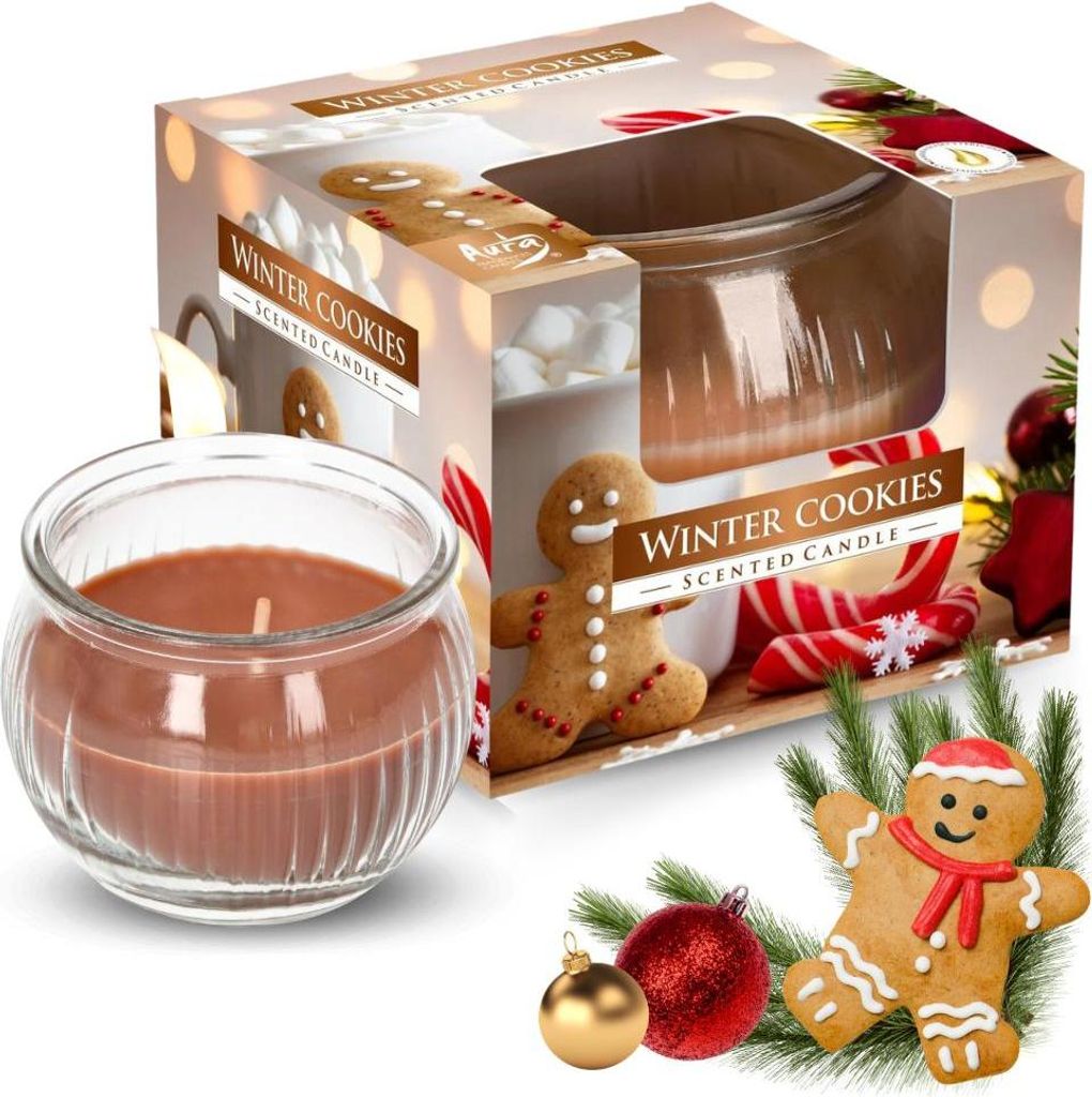 A product shot of a "Winter Cookies" scented candle in a glass jar, with its packaging and some Christmas decorations.