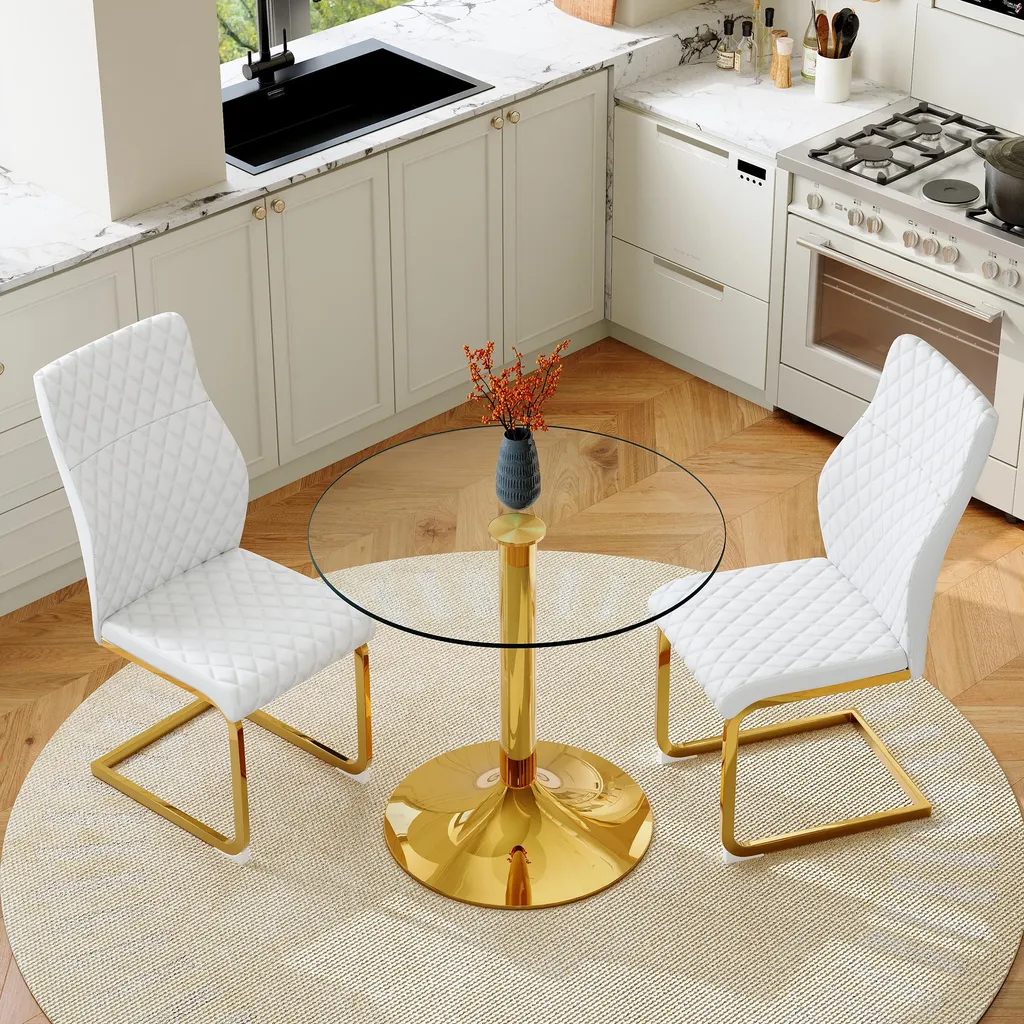 Table ronde en verre 85cm et 2 chaises dorées : confort et gain de place