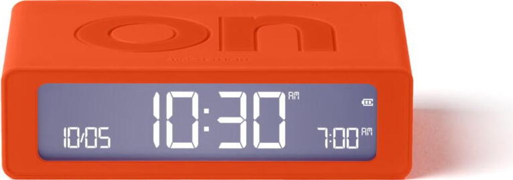 An orange digital alarm clock is shown against a white background.