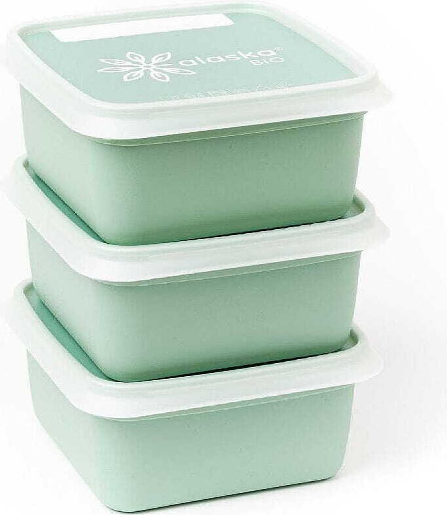 Three stacked green food storage containers with white lids.