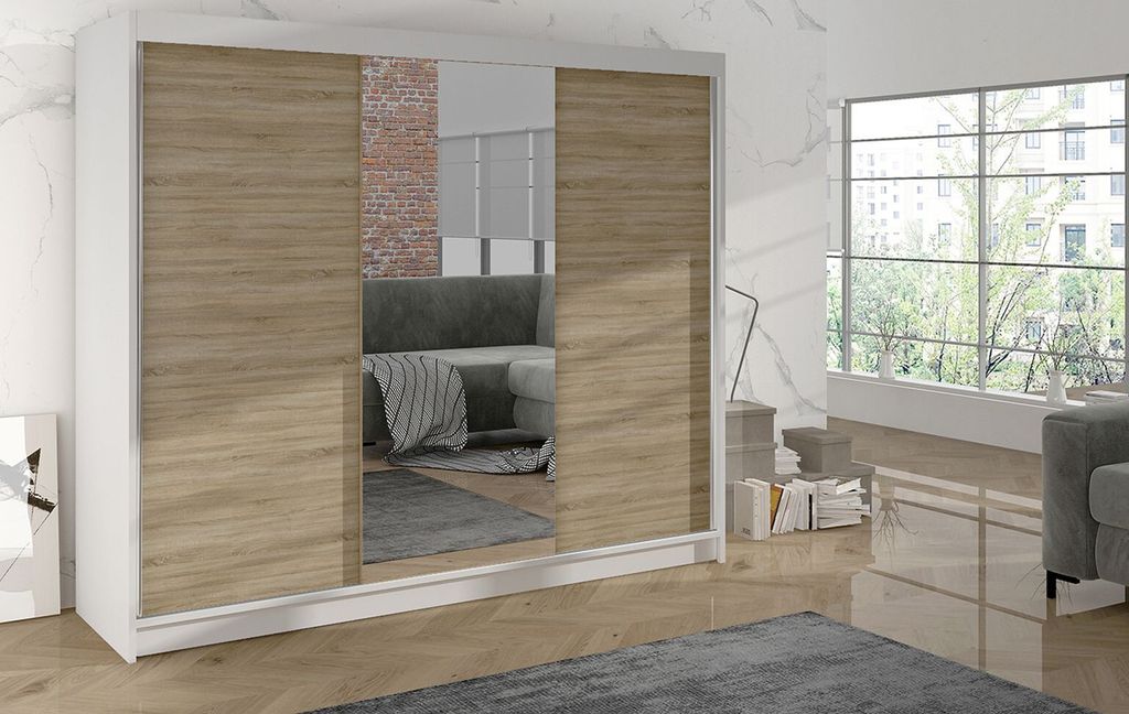 A modern wardrobe with mirrored doors and wood-effect panels, set in a well-lit room with a window and furniture.