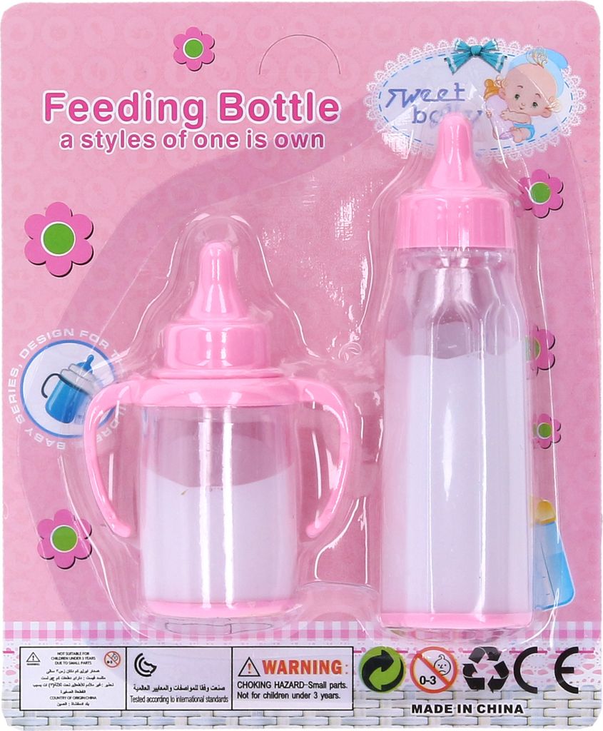 A retail package containing two baby feeding bottles, one with handles and a nipple, and another larger bottle with a nipple. The packaging is pink and decorated with floral motifs and a drawing of a baby.