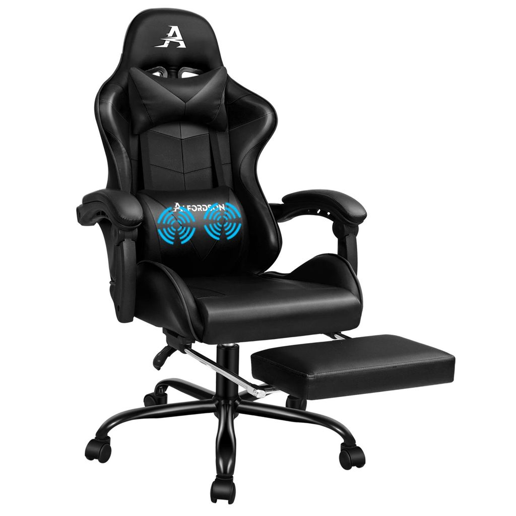 A black gaming chair with a footrest is shown against a white background.