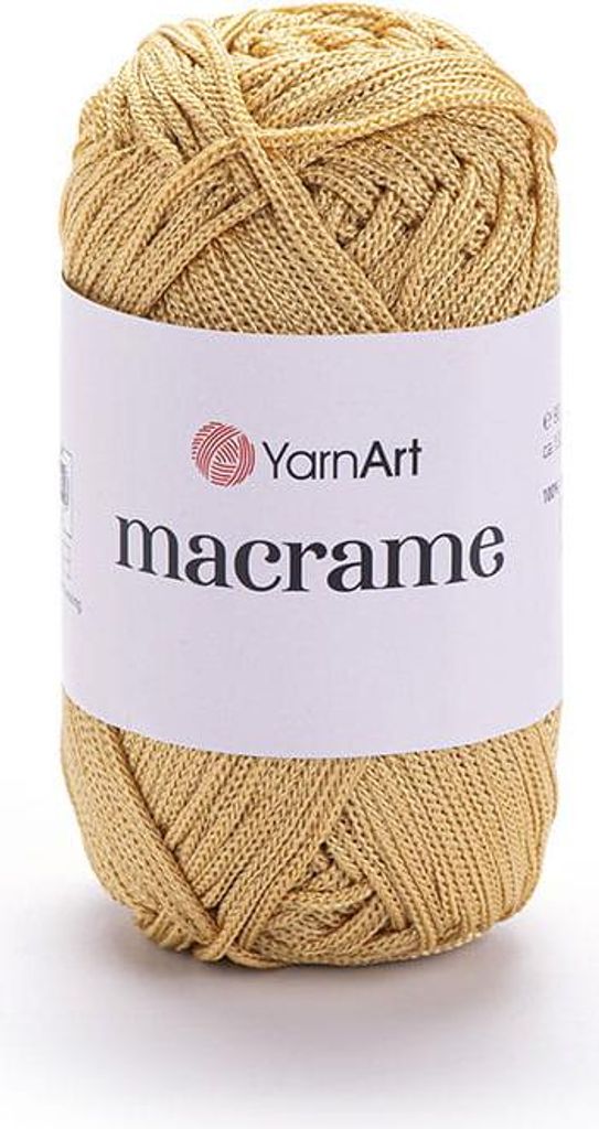 A ball of gold-colored yarn with a white label.