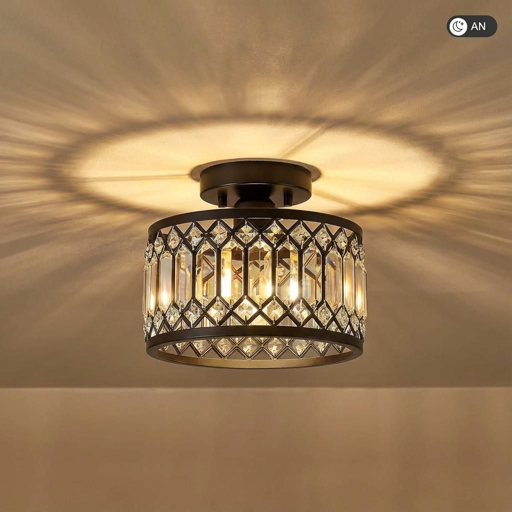 A close-up shot of a black crystal LED ceiling light mounted on a ceiling, casting intricate shadows.