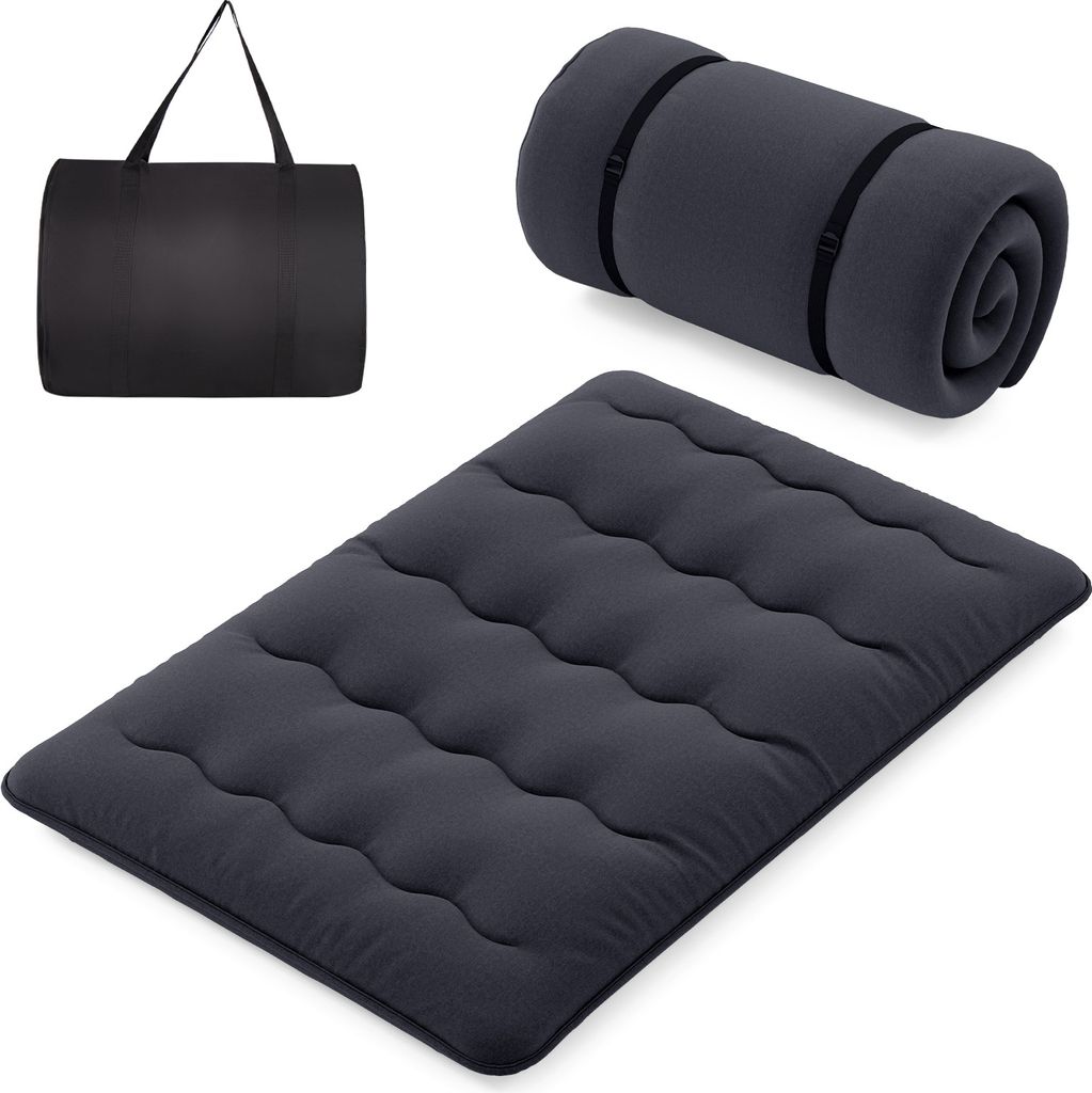 A dark gray futon mattress, a rolled-up futon mattress with straps, and a dark gray carrying bag are displayed against a white background.